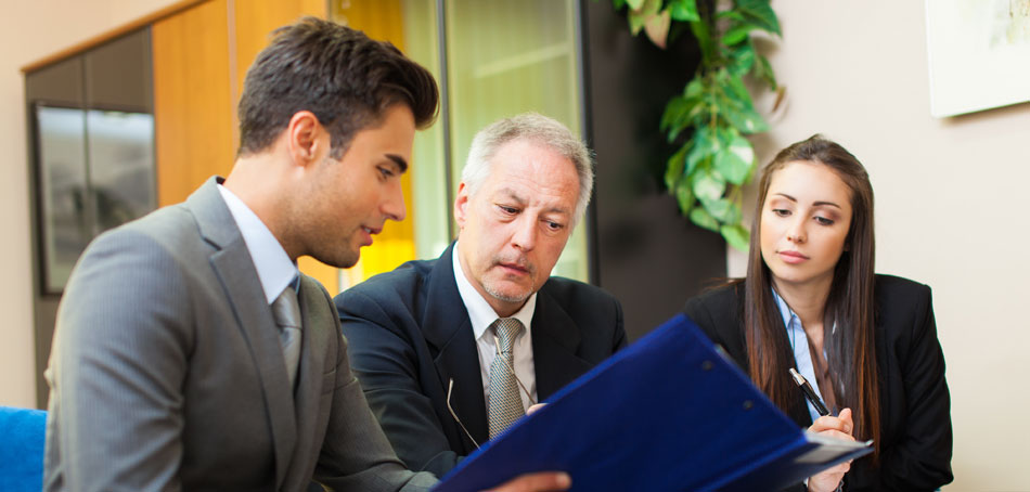 business team of 2 men and 1 woman discussing accounting manager services from Optima Office