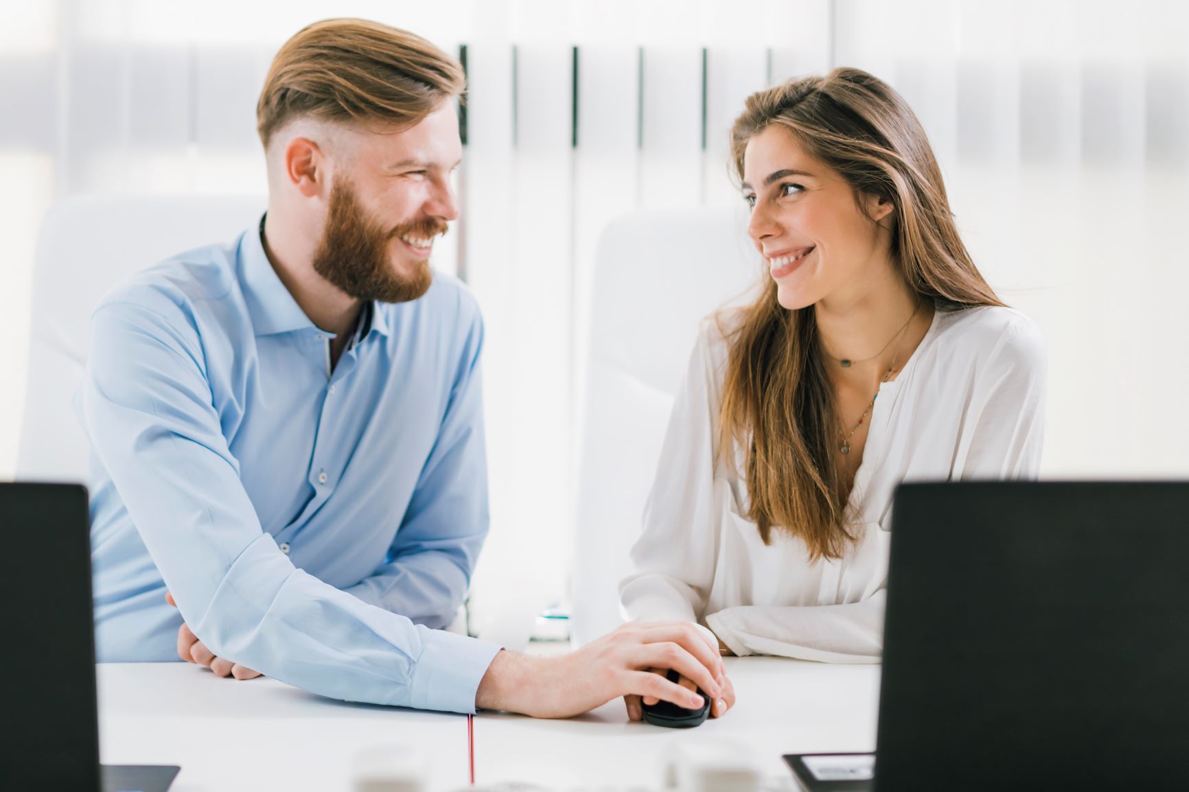 Young woman talking with outsourced employee relations manager from Optima Office